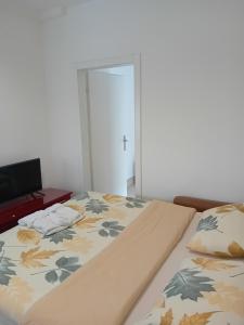 Postel nebo postele na pokoji v ubytování WING 3 apartman ,,BC ,,