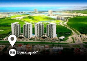 an aerial view of a city with tall buildings at Majaguar in Cancún