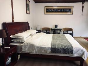 Jayden NAXI Healing Lodge臣安纳西疗愈小院 - Namaste客房内的一张或多张床位