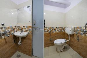 Koupelna v ubytování Super Hotel O Malviya Nagar Inn