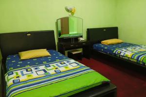 Postel nebo postele na pokoji v ubytování Hotel Antik + 20 fotografií