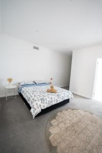 Postel nebo postele na pokoji v ubytování Spacious & Modern 4 Bedrooms