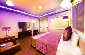 Voodi või voodid majutusasutuse Wen Sha Bao Motel-Xinying toas