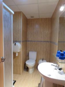 Koupelna v ubytování Hotel Alain