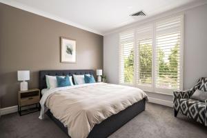 Ένα ή περισσότερα κρεβάτια σε δωμάτιο στο The Banks