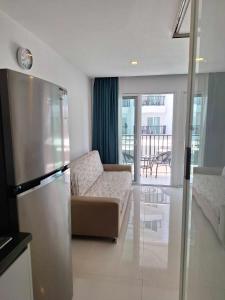 Postel nebo postele na pokoji v ubytování Mantra condo by malai