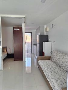 Postel nebo postele na pokoji v ubytování Mantra condo by malai