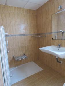 Koupelna v ubytování Hotel Alain