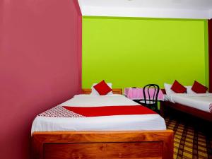 Posteľ alebo postele v izbe v ubytovaní SPOT ON 37875 Hotel Kirtti Inn