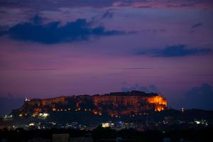 a view of the table mountain at night at The Hosteller Jodhpur in Jodhpur