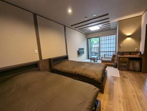 ryokan 天龍にあるベッド