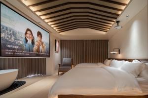 صورة لـ Mochi Luxury River View Resort Hotel (Yangshuo Xingping Ancient Town Lijiang Branch) في يانغتشو