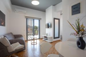 A seating area at Aonia Luxurious Modern Boutique Apartments