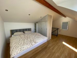 Postelja oz. postelje v sobi nastanitve Apartmaji Paletino