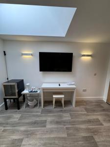 TV a/nebo společenská místnost v ubytování 9 Sheraton Apartments