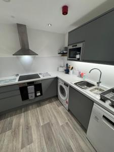 Kuchyň nebo kuchyňský kout v ubytování 9 Sheraton Apartments