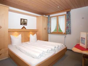 Krevet ili kreveti u jedinici u objektu Comfortable Apartment in Damüls with Swimming Pool