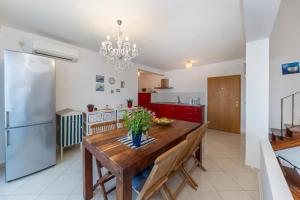 Kuchyň nebo kuchyňský kout v ubytování Penthouse Ugljan by Belmont Realty