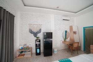 Postel nebo postele na pokoji v ubytování Ubu Villa Pulowatu 1 - 1 BR Villa in Yogyakarta