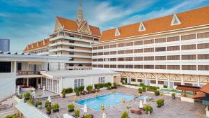 an overhead view of a hotel with a swimming pool at Hotel Cambodiana in Phnom Penh