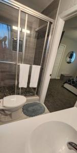 A bathroom at Great Location! Everything you'll need! Spacious and Modern Design