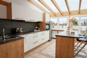 A cozinha ou cozinha compacta de Boho Apartment für 4 Wunderschöne Dachterrasse