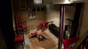 an aerial view of a room with a bike in it at Love room Perpignan donjon 35mn de Perpignan in Perpignan