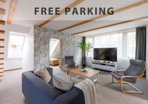 TV a/nebo společenská místnost v ubytování VOUSATÁ DÁMA - PS3 - Parking free