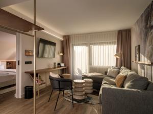 Ein Bett oder Betten in einem Zimmer der Unterkunft Hotel Schnitterhof