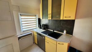 Kuchyň nebo kuchyňský kout v ubytování Ferienapartment Seemöwe im Haus "Baltic See"