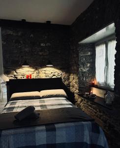 Ένα ή περισσότερα κρεβάτια σε δωμάτιο στο La casetta sul fiume