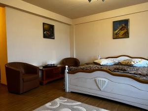 Posteľ alebo postele v izbe v ubytovaní B&B Castle Apartments