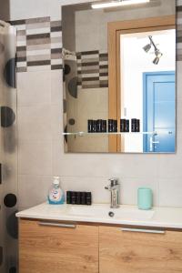 Ванная комната в Thea Apartments