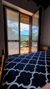 Postel nebo postele na pokoji v ubytování Valle Intelvi - Como Lake
