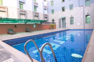 Πισίνα στο ή κοντά στο Jogor Hotel Ibadan