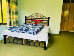 Кровать или кровати в номере Ilyasin Guest House