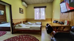 Katil atau katil-katil dalam bilik di Diamond Hotel Dushanbe