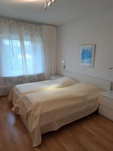 Postel nebo postele na pokoji v ubytování Lornsenhof App 14