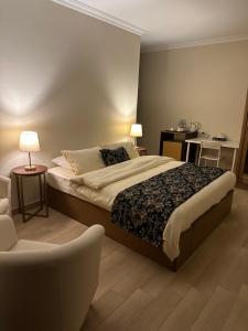 A bed or beds in a room at Rentrific