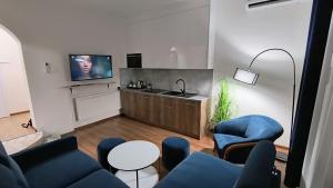 Kuchnia lub aneks kuchenny w obiekcie La Mer Pokoje i Apartamenty