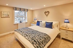 Postel nebo postele na pokoji v ubytování Morse Cottage