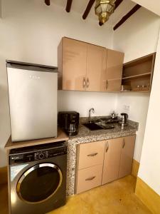 Kuchyň nebo kuchyňský kout v ubytování Little 24