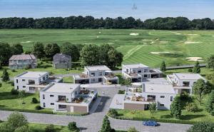 an aerial view of a house with a golf course at Revier Albatros 23 - KASTELLA in Lohme