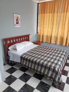 Кровать или кровати в номере Captivating 4-Bed House in Tena