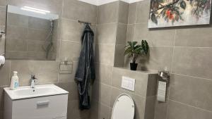Koupelna v ubytování Live Tulcea Hotel + 37 fotografií