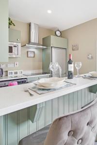 a kitchen with a counter with a plate on it at Seaview Lodge Studio 'Sleeping 2 guests' in Burnfoot