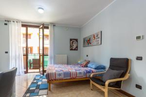 מיטה או מיטות בחדר ב-El Sol Residence - Modern house near Milan