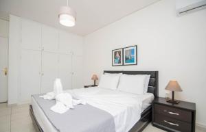 Postel nebo postele na pokoji v ubytování Lemon Tree Zante city Apartment by "elite"