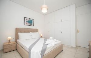 Postel nebo postele na pokoji v ubytování Lemon Tree Zante city Apartment by "elite"