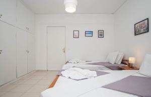 Postel nebo postele na pokoji v ubytování Lemon Tree Zante city Apartment by "elite"
